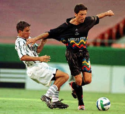 Kansas City Wizards midfielder Preki, right, has gone from defying time to biding it. He hasn't played a minute this season.
(Associated Press / The Spokesman-Review)