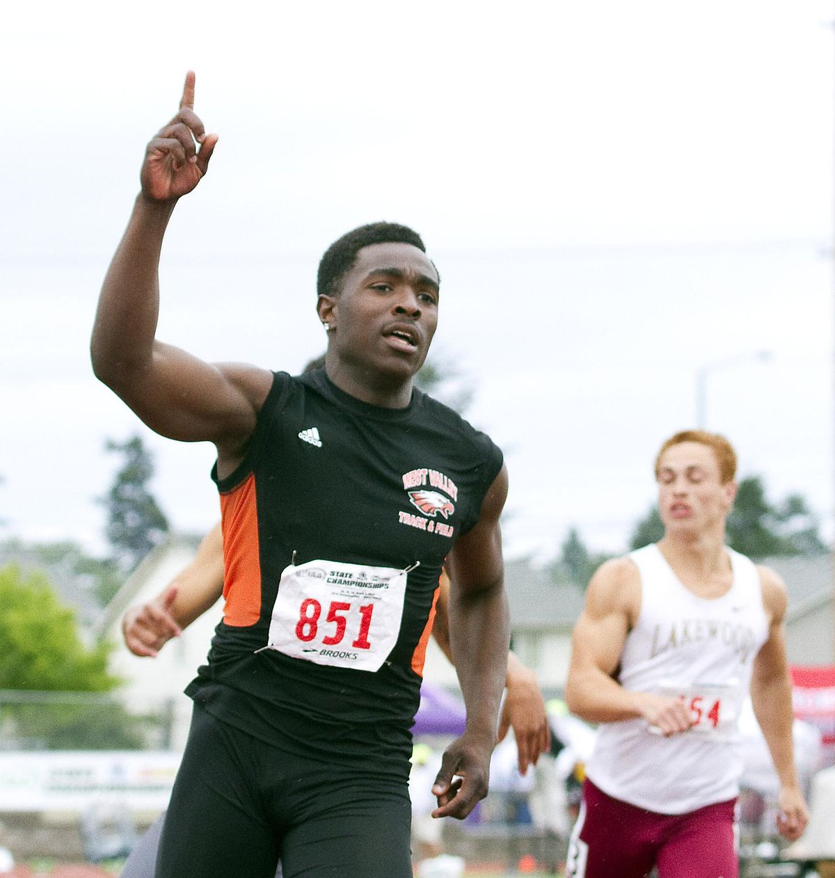 West Valley’s Zechariah Herford reacts to winning the State 2A 100-meter dash on Saturday, May 28, 2016, in Tacoma. (Patrick Hagerty / Special to The Spokesman-Review)