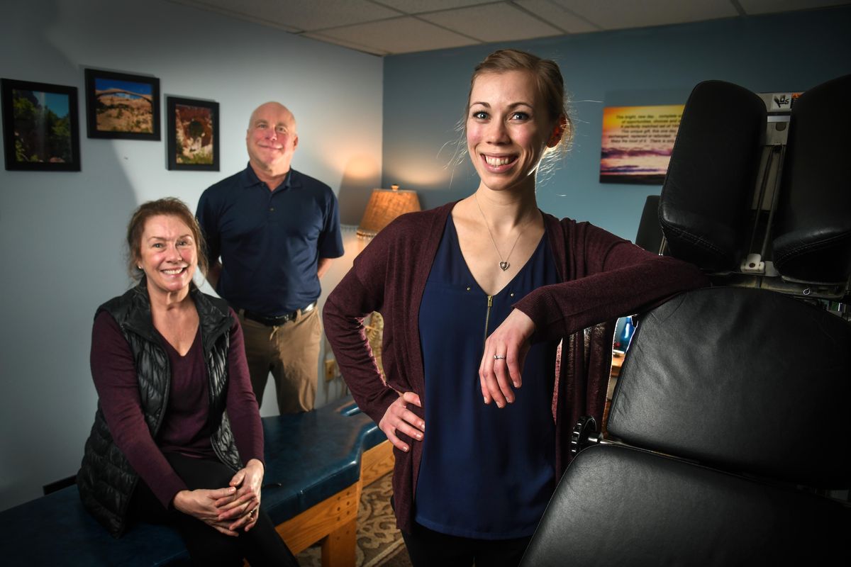 Dr. Kristina Nielsen, right, is from a long line of family chiropractors, including her parents, Drs. Kim and Blake Nielsen. (Dan Pelle / The Spokesman-Review)