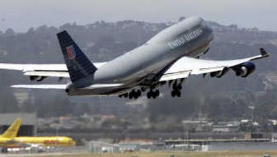 
A United Airlines plane leaves San Francisco International Airport, in this 2006 file photo. United Airlines intends to expand about 15 percent internationally over the next three years but has no interest in growing its domestic operations in the current challenging marketplace, a senior executive of the carrier said Tuesday. Associated Press
 (File Associated Press / The Spokesman-Review)