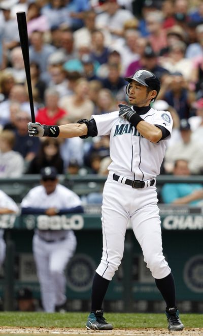 Ichiro Suzuki tugs at his sleeve during a July 15 at-bat against the Texas Rangers, just like he did during every one of his 7,858 at-bats as a Seattle Mariner. Ichiro was traded to the Yankees on July 23, 2012, after 11 1/2 years as a Mariner. (Associated Press)