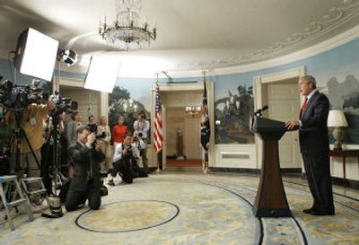 
President Bush, in the Diplomatic Reception Room of the White House on Tuesday, speaks to the press about Darfur. 
 (Associated Press / The Spokesman-Review)