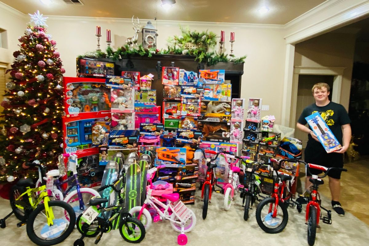 Reed Marcum with some of the toys donated by people in McAlester, Okla., last year for the annual 4-H Toy Giveaway that he started in 2016. (Angie Miller/Handout)