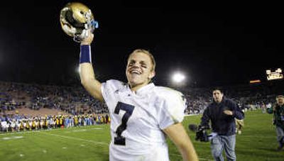 
Notre Dame quarterback Jimmy Clausen celebrates a victory. Associated Press
 (Associated Press / The Spokesman-Review)