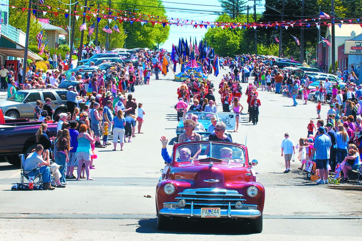Above: Classic cars, marching bands and floats make their way along East Main Street during the annual Flag Day parade in Fairfield on  Saturday.  (Colin Mulvany)