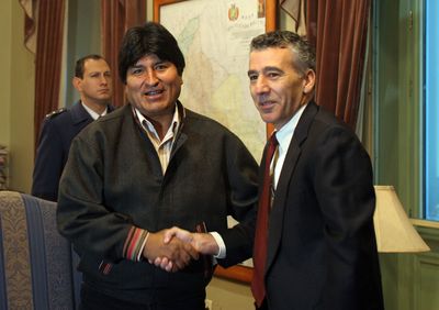 Bolivia’s President Evo Morales, left, shakes hands with U.S. Ambassador to Bolivia Philip Goldberg, during a meeting at the presidential palace in La Paz in September 2007.  (File Associated Press / The Spokesman-Review)