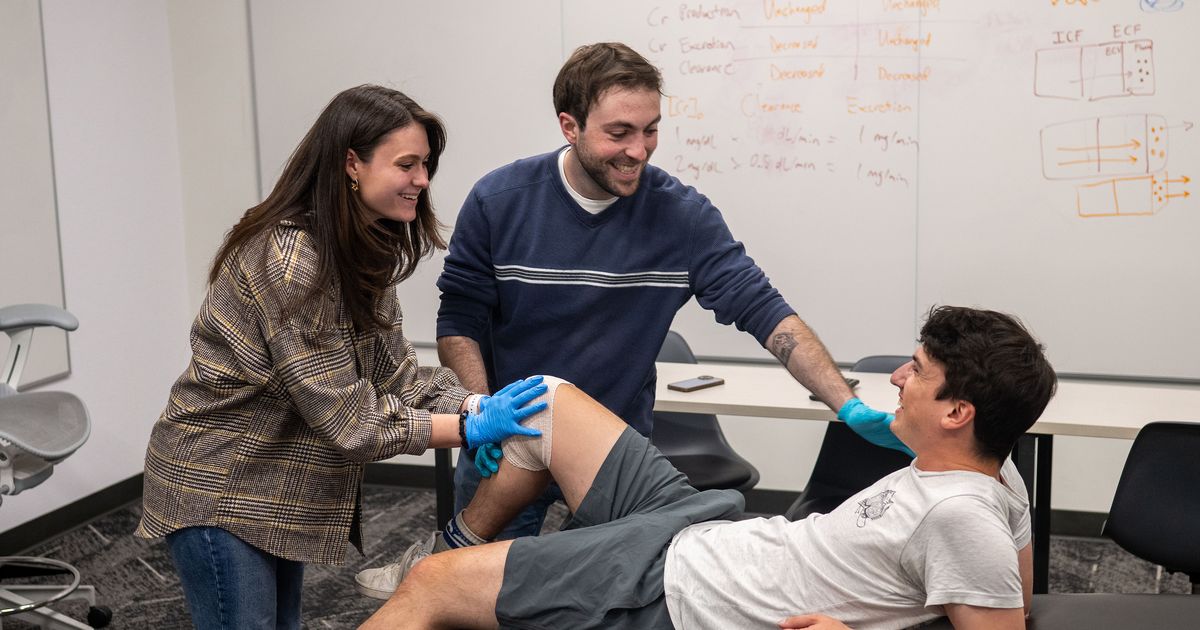 Local medical students trade running shoes for bandage tape as they treat Bloomsday racers
