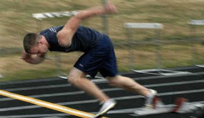 
Timberlake High School sprinter Nick Puckett takes off during practice at the school in Spirit Lake. 
 (Kathy Plonka / The Spokesman-Review)