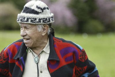 Billy Frank smiles as he walks along the Nisqually River near Olympia, where he was born and lived as a child. The Nisqually Indian elder and activist contributed leadership and multiple arrests to the battle fought by Northwest Indian tribes for their treaty-negotiated salmon-fishing rights. 
 (Associated Press / The Spokesman-Review)