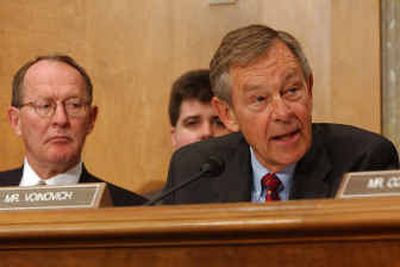 
Senator George Voinovich, R-Ohio, takes part in debate during a hearing Thursday regarding John Bolton's fitness to be U. S. ambassador to the United Nations. Voinovich later broke ranks and said he could not support Bolton.
 (Associated Press / The Spokesman-Review)