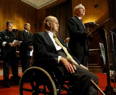 
James Brady, the namesake of the 1994 Brady Bill that banned sale of certain assault weapons, listens to Los Angeles Police Chief William Bratton, right, as they urge the renewal of the assault weapons ban on Capitol Hill in Washington, on Wednesday.
 (Associated Press / The Spokesman-Review)