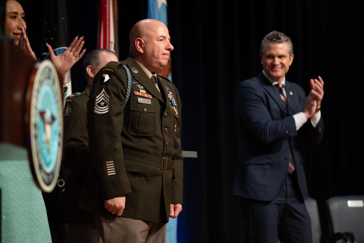 Hegseth applauds longtime friend Eric Geressy upon presenting him with the Distinguished Service Cross for battlefield exploits years earlier during a Pentagon ceremony in March. MUST CREDIT: Senior Airman Spencer Perkins/Office of the Secretary of Defense Public Affairs  (Senior Airman Spencer Perkins/Office of the Secretary of Defen)