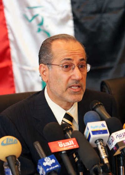 
Iraq's national security adviser, Muwafaq al-Rubaie, addresses the media after the handover of the presidential palace in Basra, Iraq. Associated Press
 (Associated Press / The Spokesman-Review)