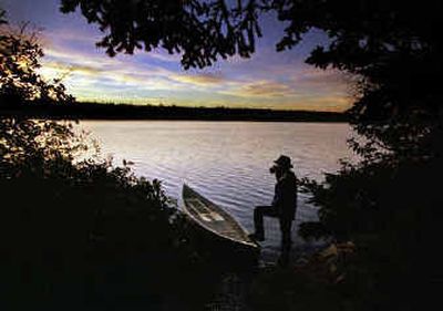 
Canoes fit the stillness on Long Lake on the Allagash Wilderness Waterway.
 (Associated Press / The Spokesman-Review)