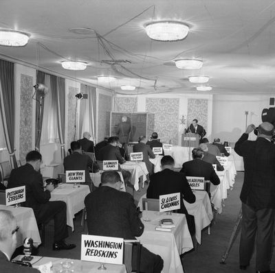 This Nov. 26, 1964 photo shows a general view of the National Football League draft meeting in New York. (John Lindsay / Associated Press)
