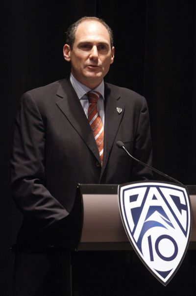 Conference commissioner Larry Scott is shooting high in new TV deal. (Associated Press)