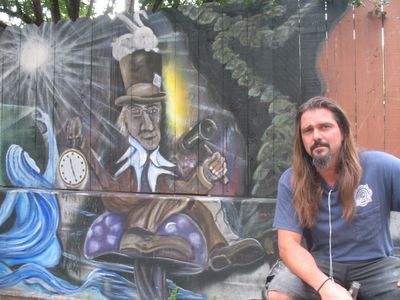 Tim Piper’s graffiti mural on the fence of South Hill home is attracting traffic to the neighborhood.  (Isamu Jordan / The Spokesman-Review)