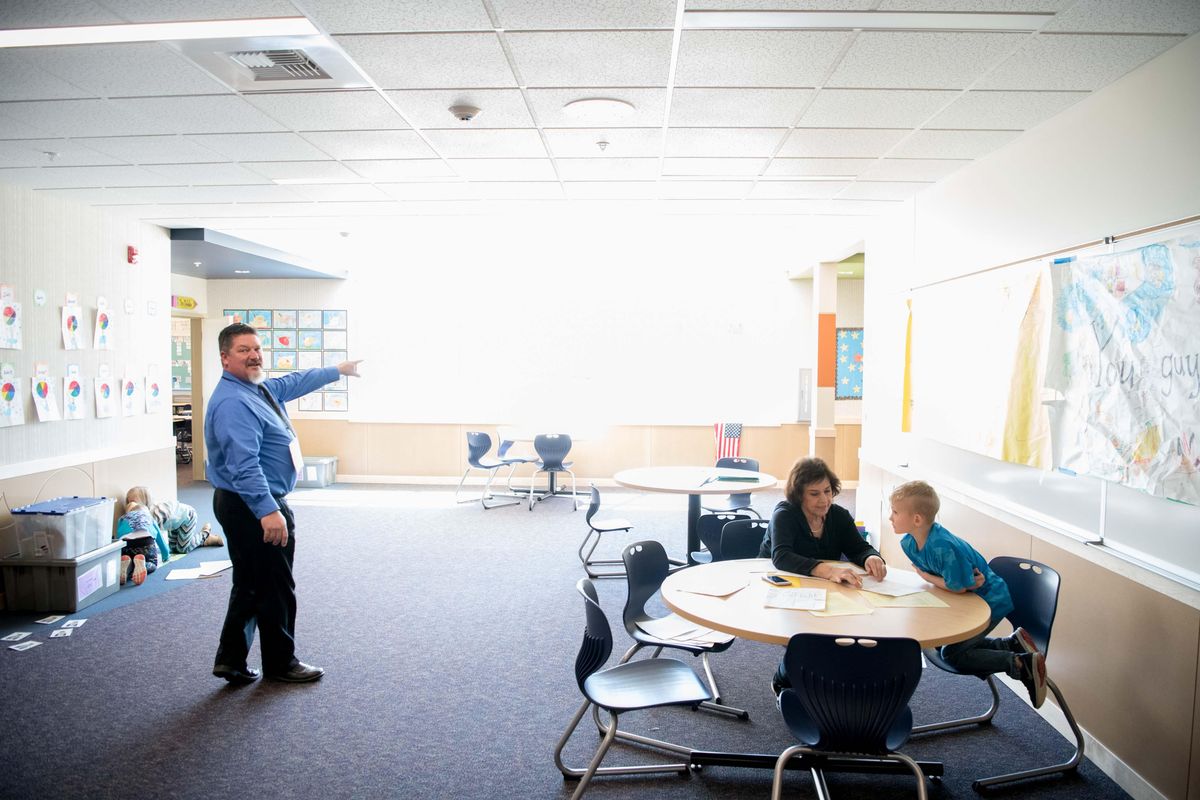 Ned Wendle, director of facilities and planning at Mead School District, center, shows off Midway Elementary School on Thursday, April 19, 2018, in Colbert, Wash. (Tyler Tjomsland / The Spokesman-Review)
