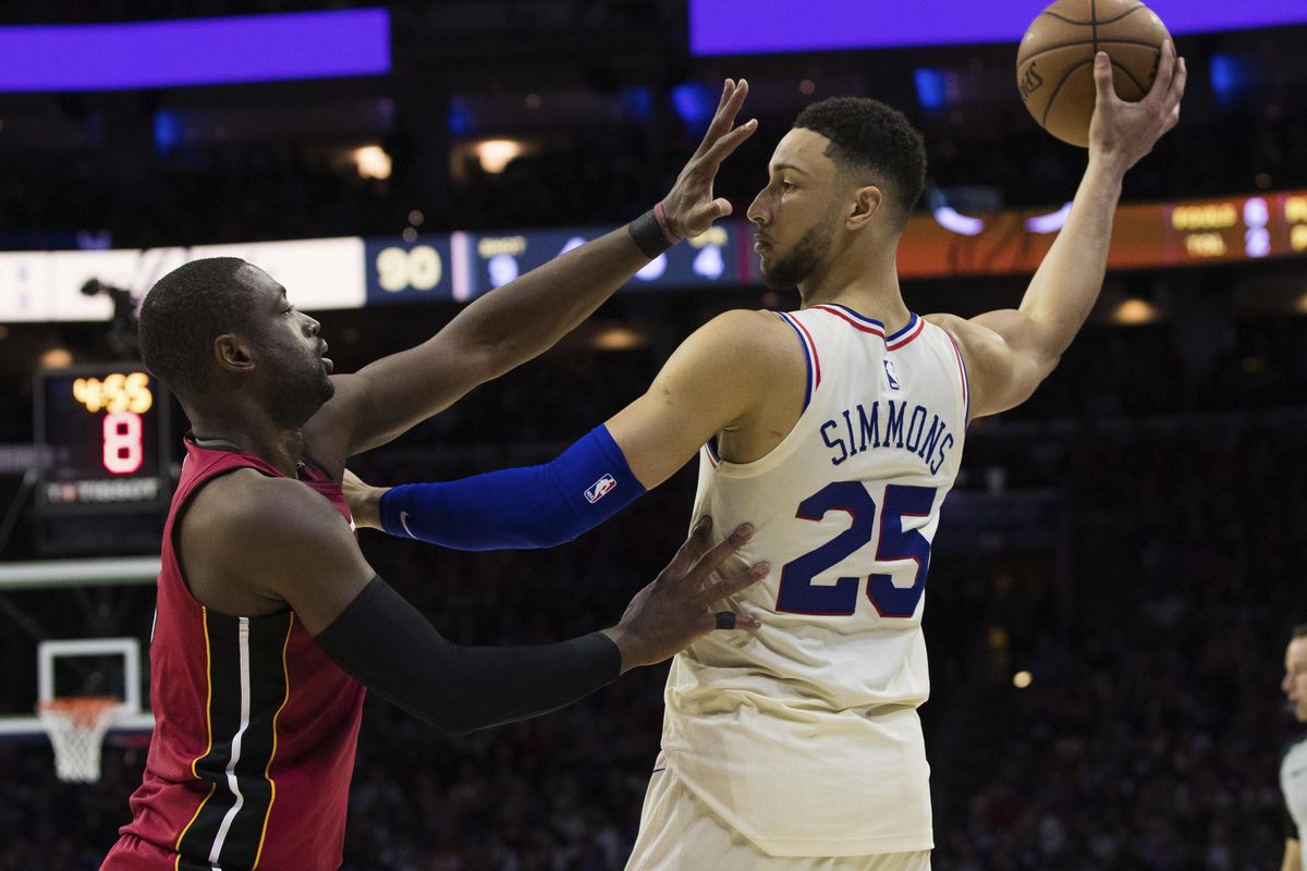 Philadelphia 76ers’ Ben Simmons, right, of Australia, holds the ball away from Miami Heat’s Dwyane Wade, left, during the second half in Game 5 of a first-round NBA basketball playoff series, Tuesday, April 24, 2018, in Philadelphia. The 76ers won 104-91. (Chris Szagola / Associated Press)