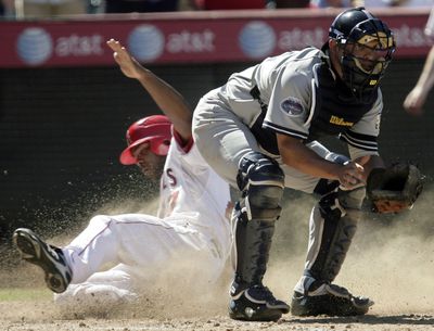 Howie Kendrick scores the game-winning run in the Angels’ victory over New York.  (Associated Press / The Spokesman-Review)