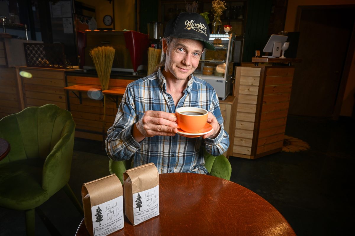 Bryn Garrehy, who roasts coffee beans in small batches and has started up Peaceful Valley Coffee Co., sits inside Patera Temperance Lounge, a shop at 1507 E. Sprague Ave., one of the first places to serve his coffee in Spokane. He sells 12-ounce bags of roasted coffee through his online store for home use.  (Jesse Tinsley/THE SPOKESMAN-REVIEW)