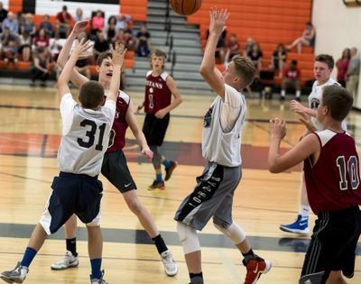 Freshmen from University and Gonzaga Prep play a game at West Valley High School, June 26. 2017. West Valley has a summer basketball league for incoming freshmen from  area high schools. (Colin Mulvany / The Spokesman-Review)