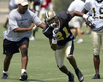 
New Orleans Saints cornerback Jason Craft (21) goes through drills at the San Antonio School District's Spring Sports Complex.
 (Associated Press / The Spokesman-Review)
