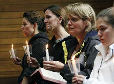 
Residents gather at the Kirkwood, Mo., United Methodist Church on Friday to remember those killed in a shooting rampage when  a gunman opened fire Thursday at a City Council meeting.Associated Press
 (Associated Press / The Spokesman-Review)