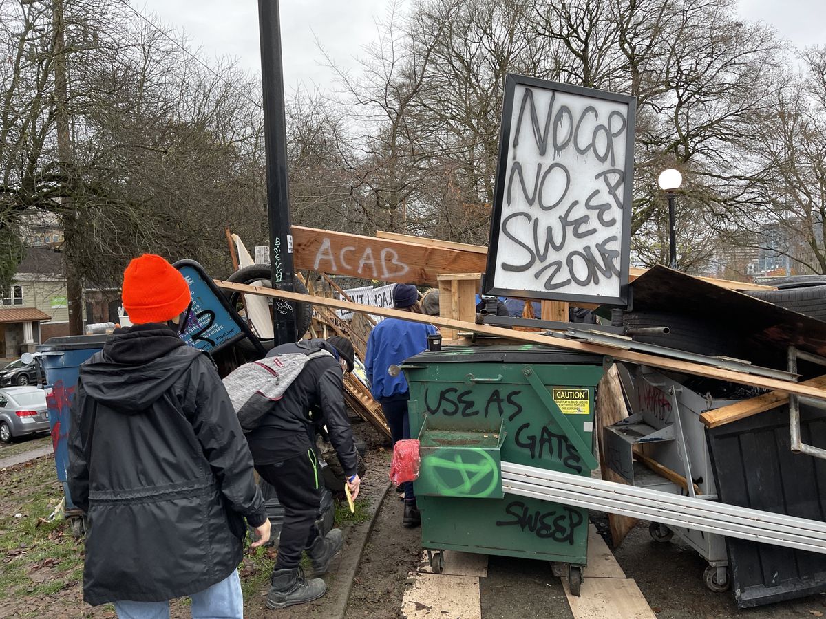 Protesters barricade Cal Anderson Park to stop homeless ...