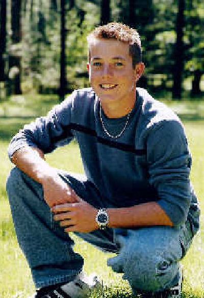 
Kevin Moore in his senior portrait. 
 (The Spokesman-Review)