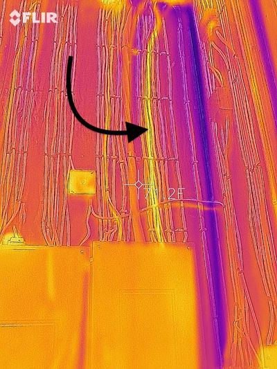 This infrared photo clearly shows two electric cables that are much warmer than the others.  (Tribune Content Agency)
