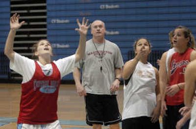 
Central Valley girls basketball coach Freddie Rehkow runs practice Tuesday. He's come back over from East Valley, after taking the Knights to their first ever state tournament last year. 
 (J. BART RAYNIAK / The Spokesman-Review)