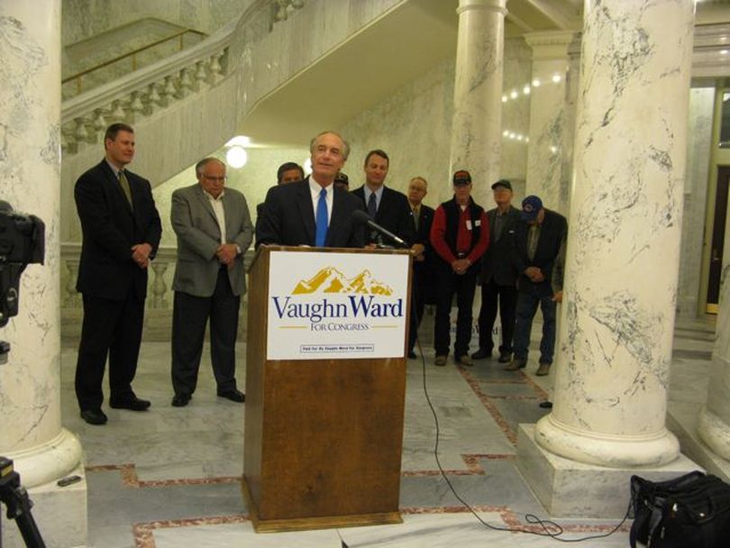 Former Idaho Gov. Dirk Kempthorne introduces GOP congressional candidate Vaughn Ward, who can be seen just to the right of Kempthorne, at a press conference in the Statehouse rotunda on Tuesday. The former governor, U.S. senator and U.S. Secretary of the Interior enthusiastically endorsed Ward, who worked on Kempthorne's Senate campaign 18 years ago, then served on his Senate staff before joining the Marines and becoming a decorated officer serving in both Iraq and Afghanistan. (Betsy Russell)