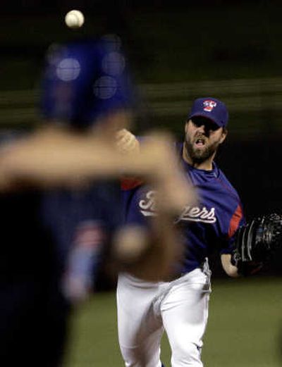 
Former Texas pitcher R.A. Dickey is making his case with Seattle. Associated Press
 (Associated Press / The Spokesman-Review)