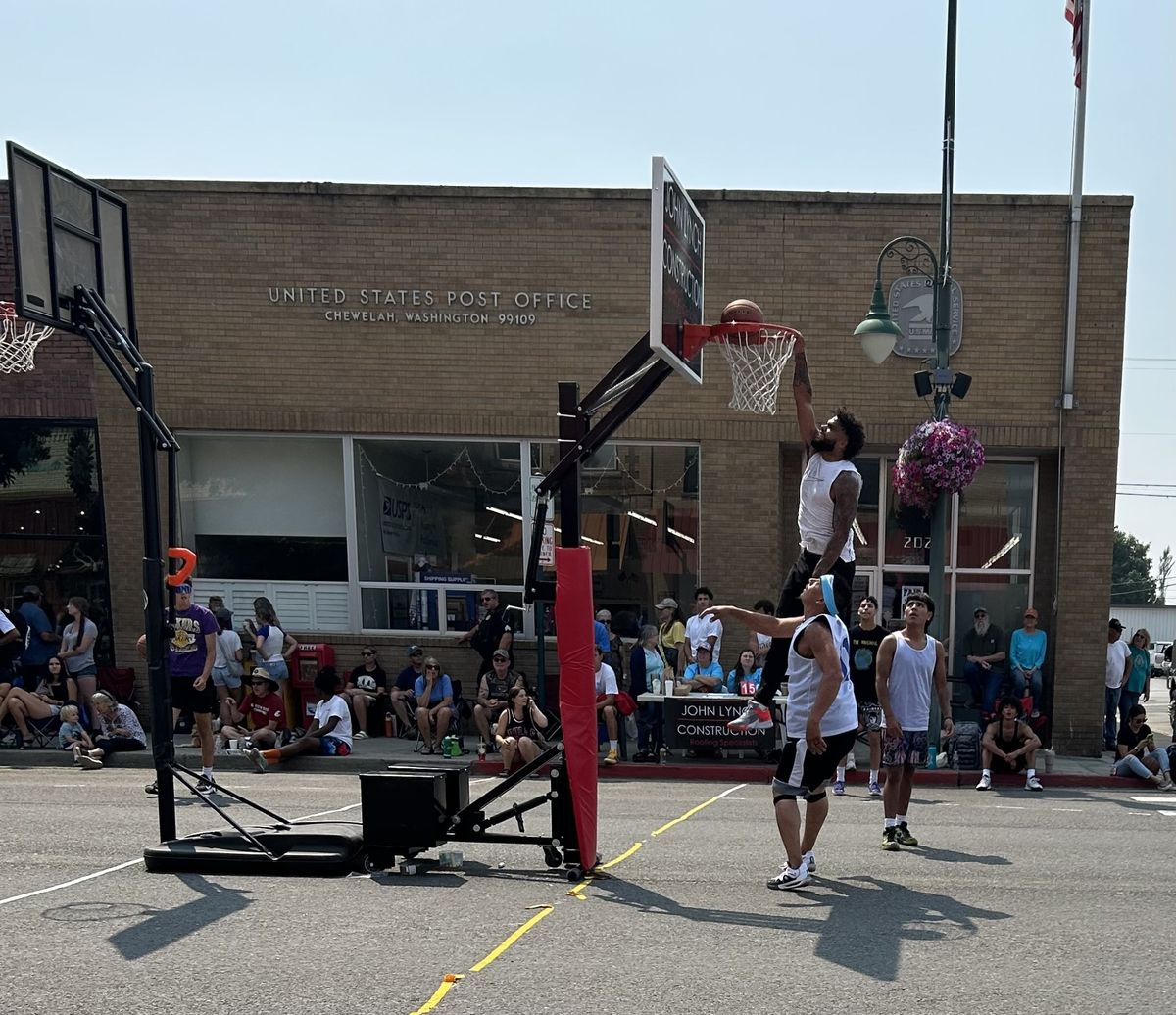 A player dunks on the opposing team while playing in the elite bracket of Courtzite on July 27 in Chewelah, Wash.  (Mathew Callaghan/The Spokesman-Review)