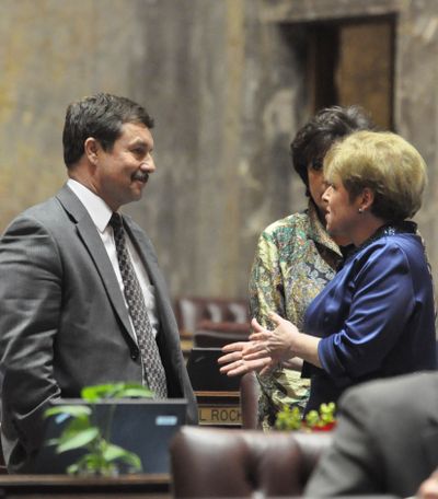 Senate Majority Leader Lisa Brown, D-Spokanke, discusses an amendment with Senate Minority Floor Leader Mark Schoesler, R-Ritzville, during debate on a bill involving domestic partnerships and surrogacy laws on April 12, 2011. Senate Majority Floor Leader Tracey Eide, D-Federal Way, is in the background. (Jim Camden/The Spokesman-Review)
