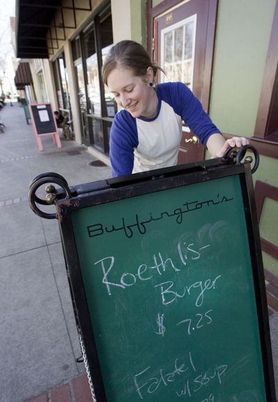 Katie Keller erases a sign Saturday, March 6, 2010, promoting a  Roethils-burger lunch special at Buffington's, one of the bars Ben Roethlisberger went to Thursday in Milledgeville, Ga. A 20-year-old college student accused Roethlisberger, the Pittsburgh Steelers quarterback, of sexually assaulting her at the nearby Capital City nightclub early Friday during a night on the town near where he owns a lake home. Buffington's decided to rename the burger. (John Amis / Fr69715 Ap)