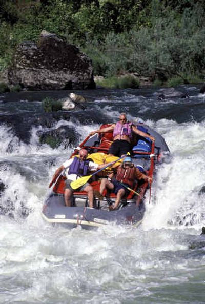
A raft plunges down a rapid on Oregon's Rogue River.A raft plunges down a rapid on Oregon's Rogue River.
 (Photo courtesy of James Henry River JourneysPhoto courtesy of James Henry River Journeys / The Spokesman-Review)