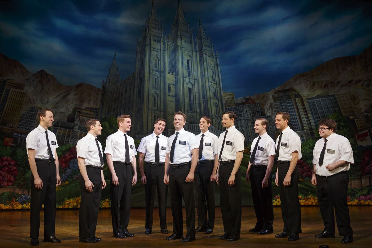 David Larsen, center, stars as Elder Price in the national tour of “The Book of Mormon,” which opens Tuesday at the INB. (Joan Marcus)