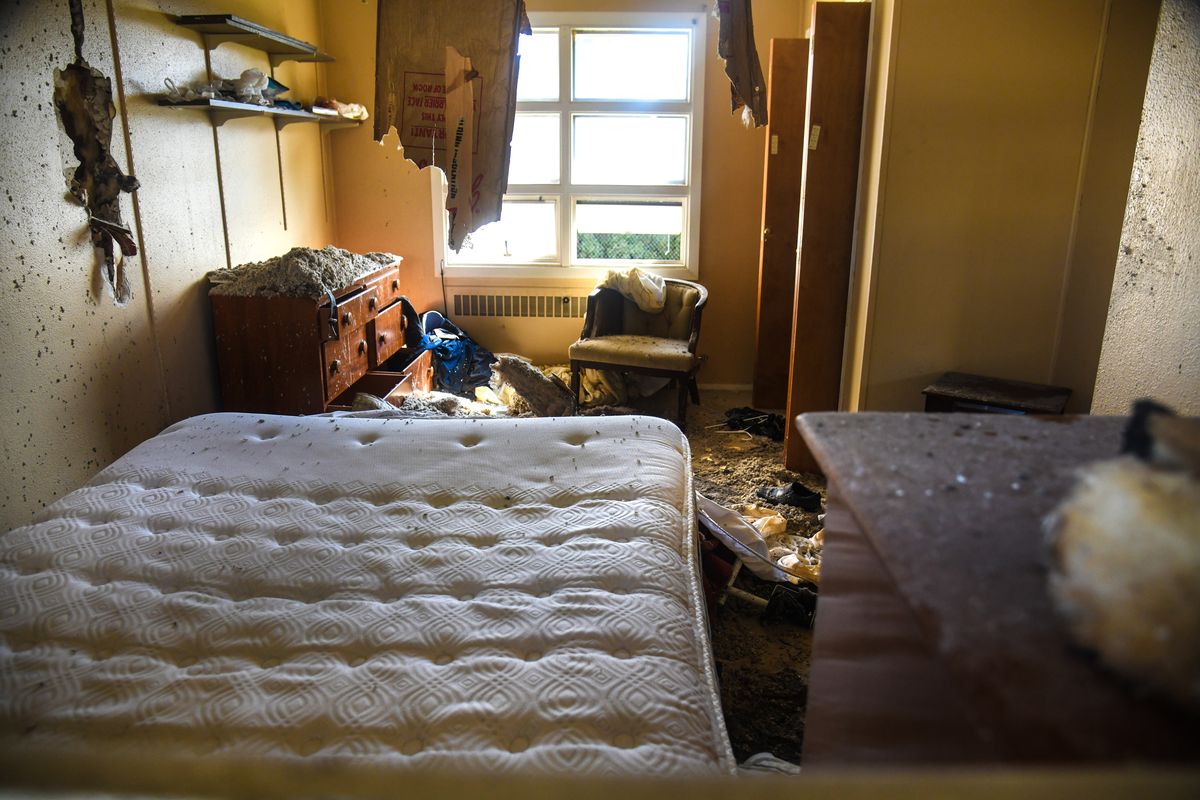 St. Charles Pastor Rev. Esteban Soler’s bedroom still shows fire damage Wednesday after an arson fire on March 18.  (DAN PELLE/THE SPOKESMAN-REVIEW)