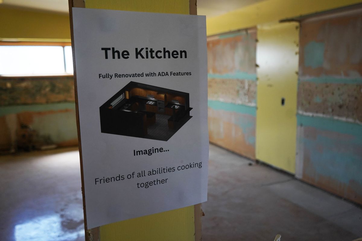 A sign left over from an open house shows the features of the remodeled Westminster Presbyterian Church kitchen which will be outfitted for use by Side By Side and Garden Church.  (John McCallum/FāVS News)