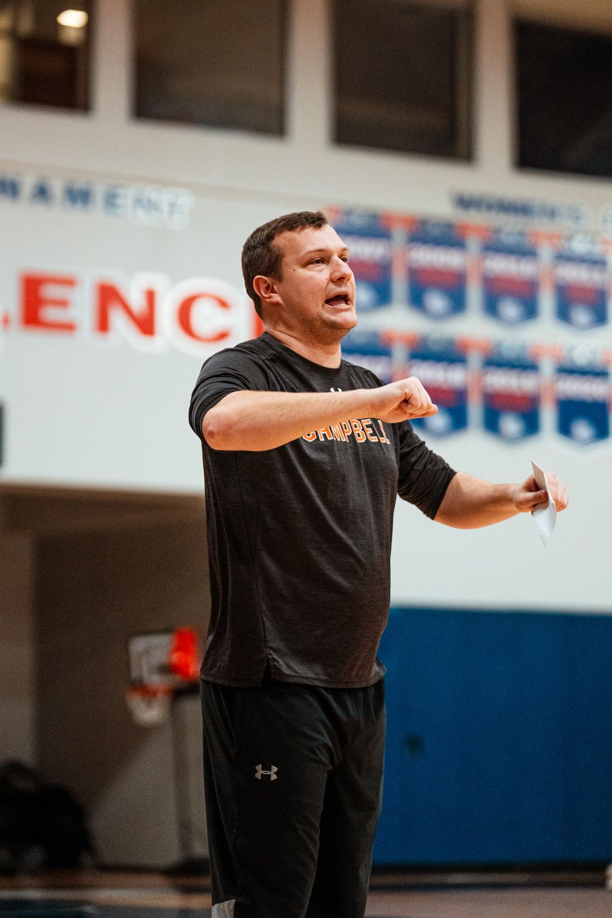 First-year Campbell coach John Andrzejek, a former Washington State and Florida assistant, gives instruction during the Camels