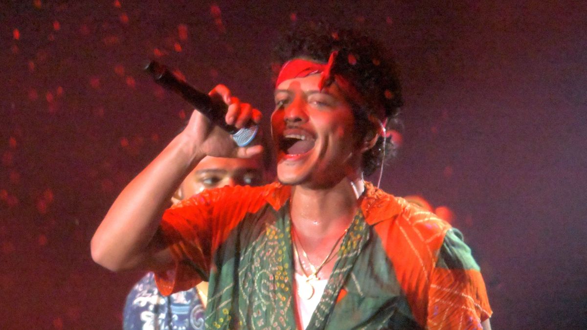 Bruno Mars performs during Preakness Day at Pimlico Race Course on May 20, 2023, in Baltimore.  (Karl Merton Ferron/Baltimore Sun)