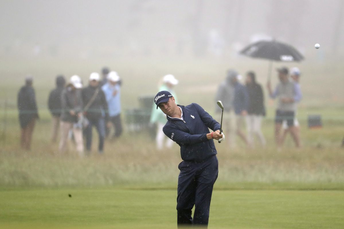 Justin Thomas hits off the eighth fairway during a practice round for the U.S. Open Golf Championship, Wednesday in Southampton, N.Y. (Julio Cortez / AP)