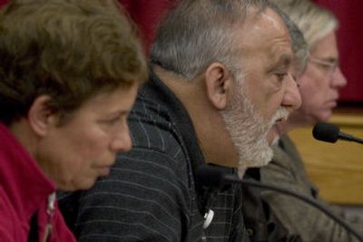 
Newly elected members of the Dover (Pa.) Area School Board, from left, Judy McIlvaine, Larry Gurreri and Rob McIlvaine, vote unanimously in favor of rescinding the inclusion of 