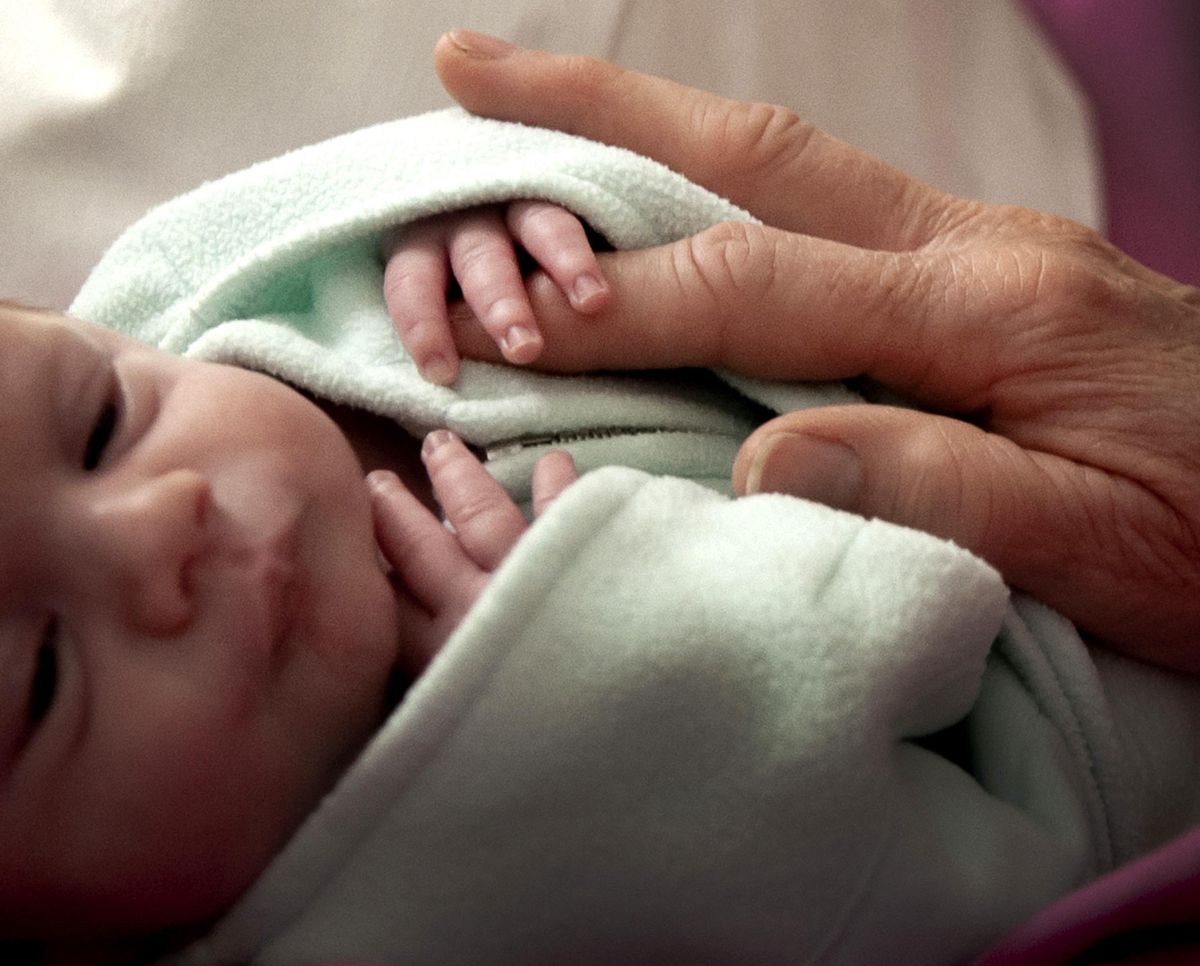 “It calms you,“ said Stephanie Snook as she holds Ethan Madruga in NICU at Kootenai Health during her shift as a Cuddler on June 5, 2019. Cuddler volunteers provide comfort and care for babies and help staff members meet the special needs of babies and their families. (Kathy Plonka / The Spokesman-Review)