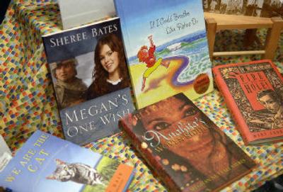 
Books from local authors are on display in the window at Children's Corner Books and Toys in River Park Square. 
 (The Spokesman-Review)