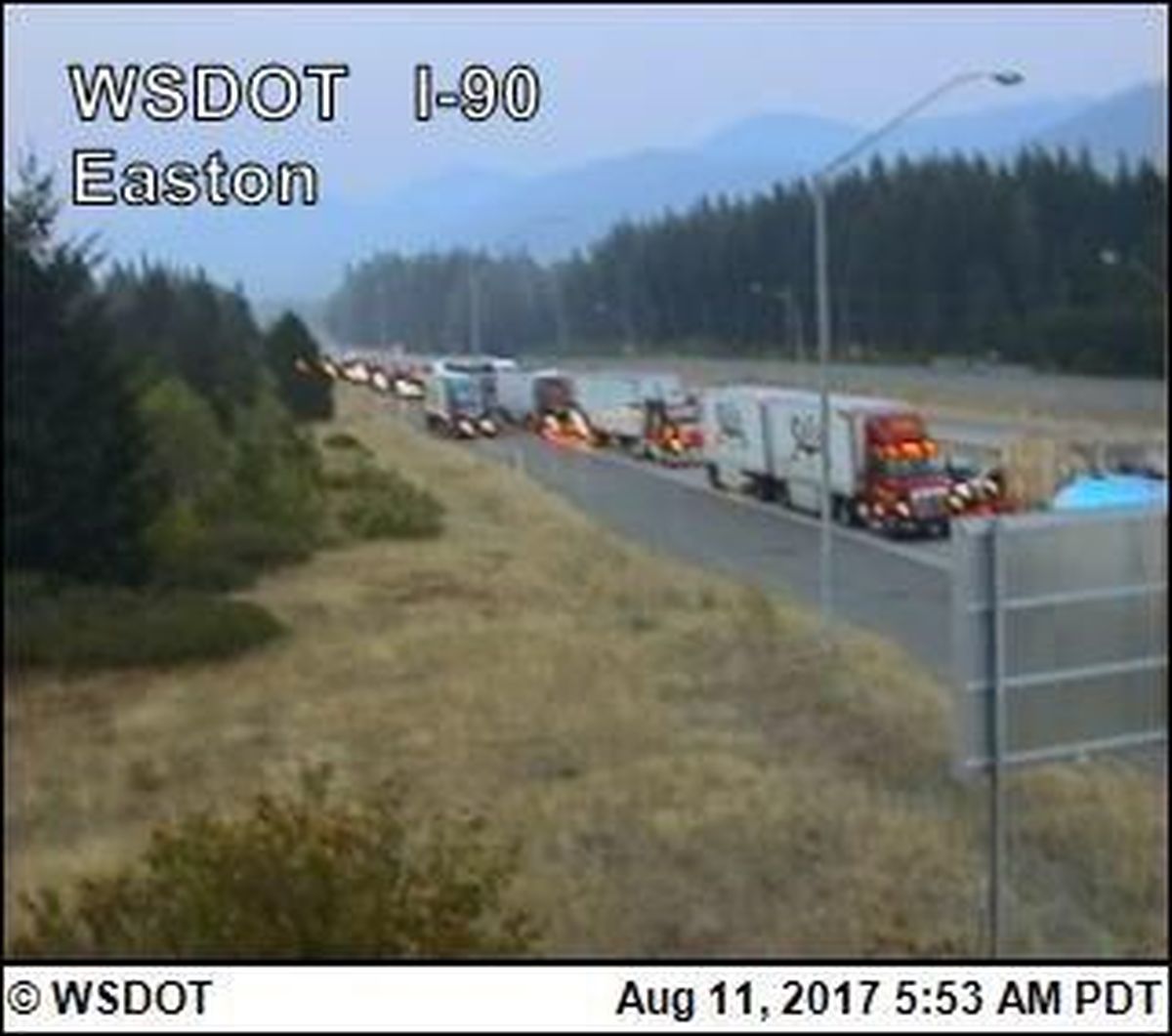 Rolled semitrucks spilled corn onto I-90 blocking westbound traffic for several hours, early Friday morning. (Courtesy photo)