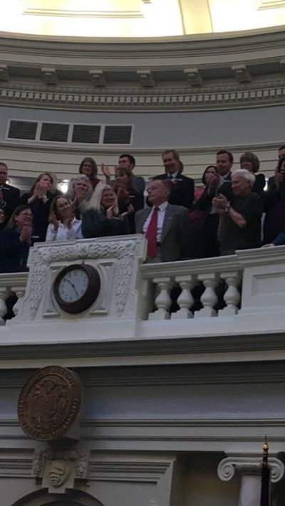 Mike Nugent, longtime chief bill drafter for the Idaho Legislature, responds to a standing ovation from the Idaho House on Friday, March 2, 2018. (Rep. Rick Youngblood)