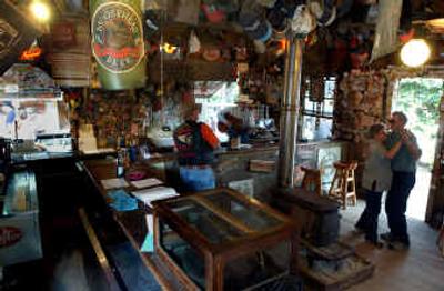 
A couple kick up their heels  on a Saturday afternoon in May, in the Luckenbach store.
 (Associated Press photos / The Spokesman-Review)